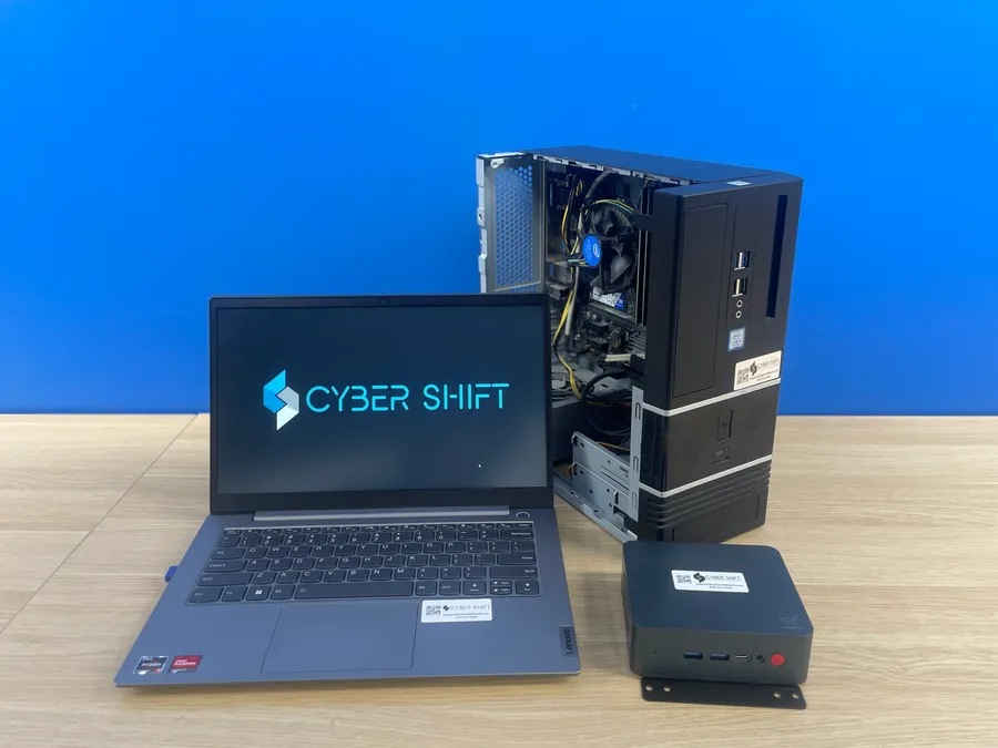 A laptop, desktop and compact PC with Cyber Shift branding