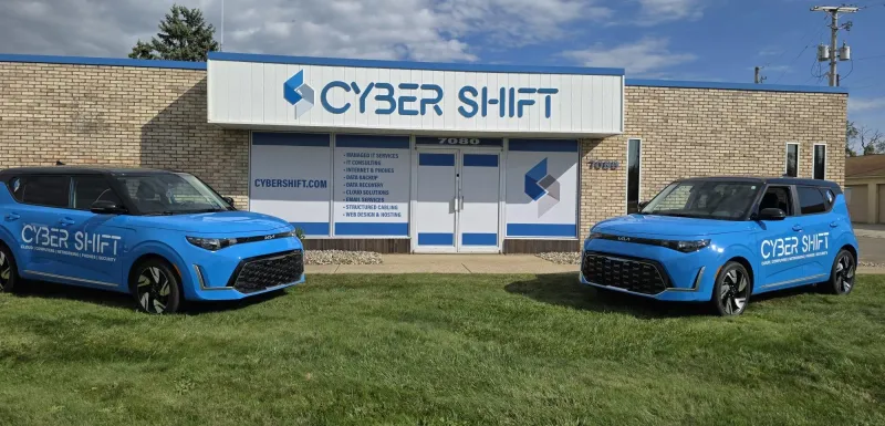Cyber Shift's branded service vehicles outside the North Canton office