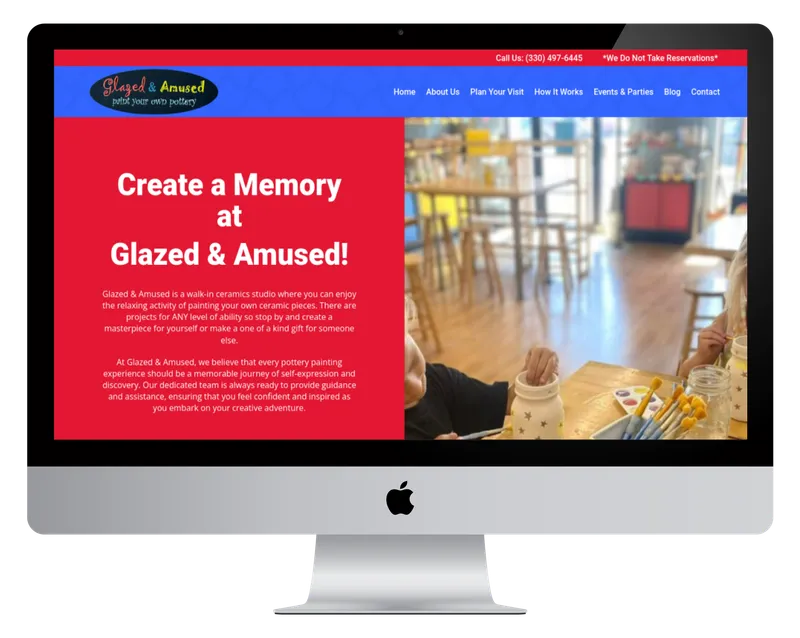 Glazed & Amused homepage on a desktop monitor, with pottery and paintbrushes on a studio table Glazed & Amused homepage on a desktop monitor, with pottery and paintbrushes on a studio table