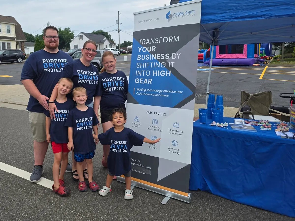 John Wheeler and his family at the Cyber Shift booth John Wheeler and his family at the Cyber Shift booth