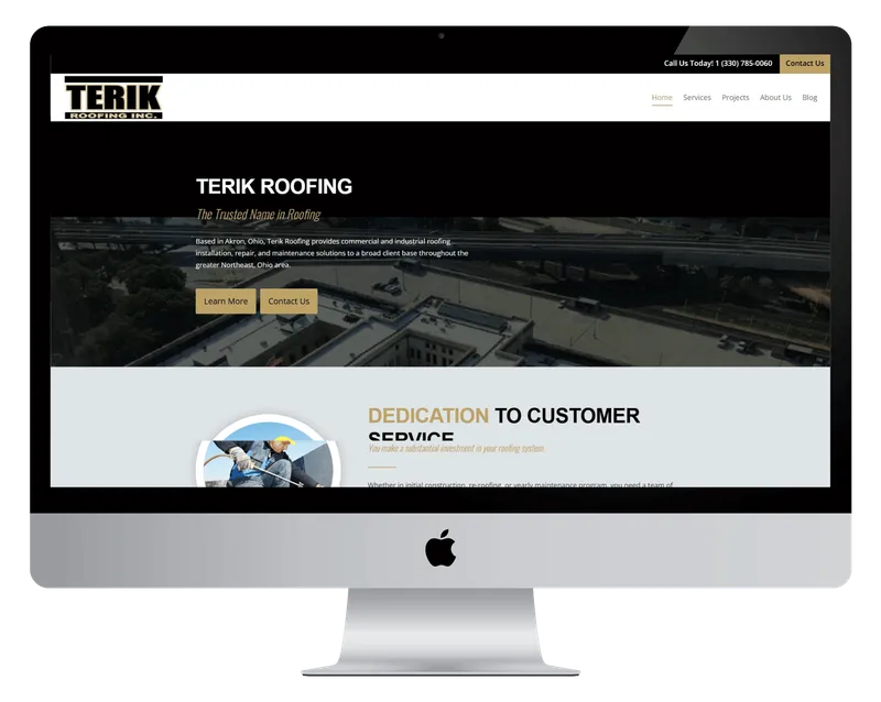 Terik Roofing homepage on a desktop monitor, with an aerial view of commercial rooftops Terik Roofing homepage on a desktop monitor, with an aerial view of commercial rooftops
