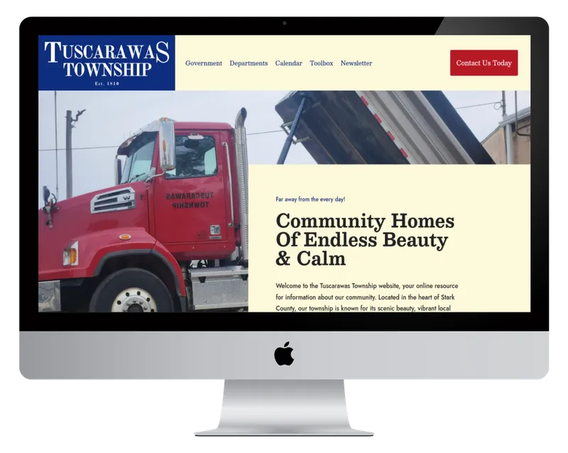 Tuscarawas Township homepage on a desktop monitor, with a red township dump truck Tuscarawas Township homepage on a desktop monitor, with a red township dump truck