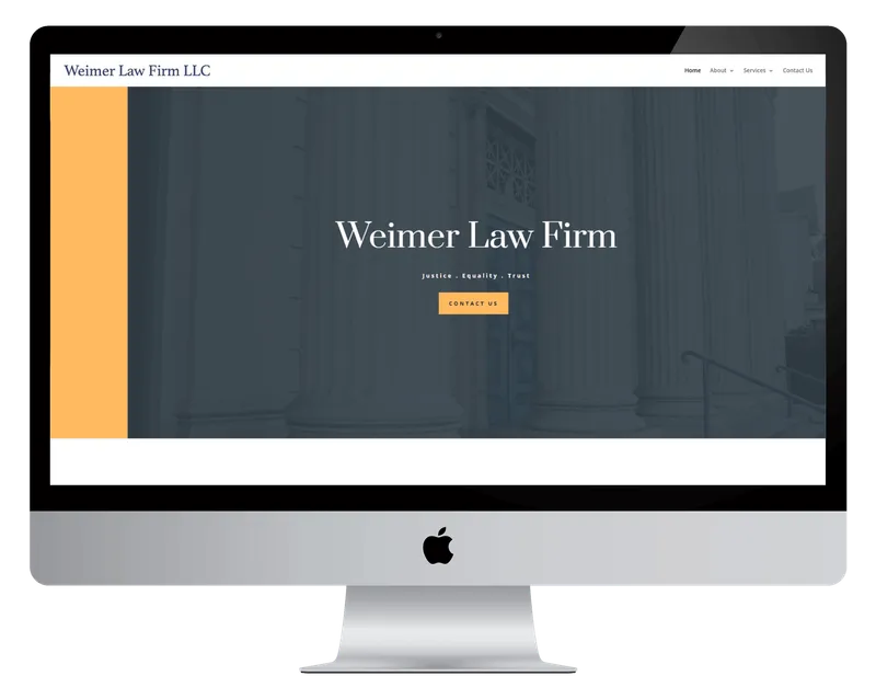 Weimer Law Firm homepage on a desktop monitor, with courthouse columns behind the firm name Weimer Law Firm homepage on a desktop monitor, with courthouse columns behind the firm name